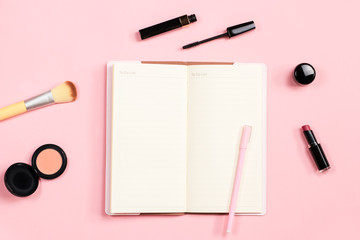 Beauty blogger objects flat lay. Beauty products and stylish female accessories on pastel pink...