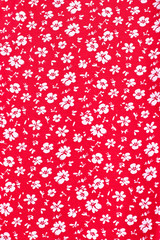 Cute pattern in small white flower. Small white flowers seamless pattern. Red textile background.