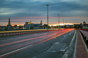 The road leading to Szczecin after sunset, traces of lights of cars