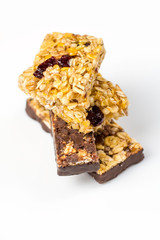 Chocolate, fruits and berries granola bars closeup