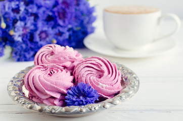 Zephyr with cup of cappuccino coffee
