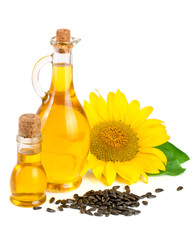 Sunflower oil, seeds and flower isolated on white background