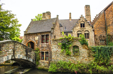 Fototapeta na wymiar Beautiful Medieval House with Bridge over Canal