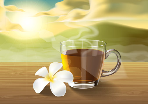 tea and plumeria on wooden table on the morning