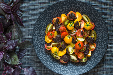 Fototapeta na wymiar Tomato salad with pesto from Jamie Oliver