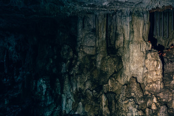 Cave with speleothem, stalactites, stalagmites and stalagnates in Adygeya
