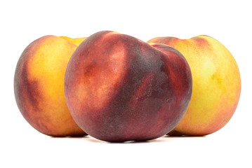 Ripe peaches on white background