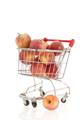 Shopping cart with red apples