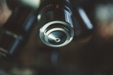 Laboratory Equipment - Optical Microscope. Microscope is used for conducting planned, research experiments, educational demonstrations in medical and health institutions, laboratories. Close up photo.