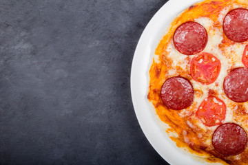 Half of pizza on the plate