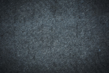 Rough texture of the stone. Gray shabby background.