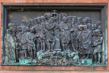 Gutenberg Monument (1840) - Bronze on a granite base, with four relief panels. From 1439 to 1444, Johannes Gutenberg, inventor of letterpress printing, lived in Strasbourg. Strasbourg, Alsace, France.