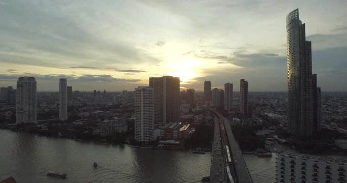 Sunset aerial view of Chao Phraya river in Bangkok, Thailand.