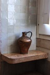 copper jug in a vintage kitchen