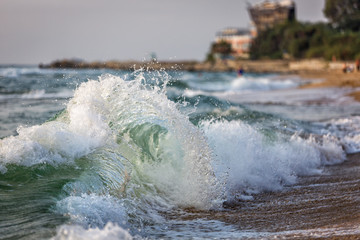 Big wave at sunrise time