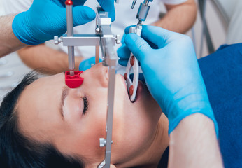 Installation of the face-bow. Functional diagnostics.