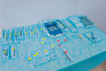 Dental tools on blue background.