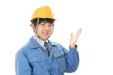 案内する労働者