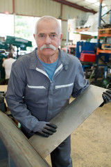 industrial man worker in factory workshop