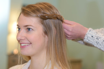 Naklejka premium woman getting hairdo
