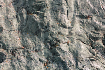 Gray stone ok rock wall background texture