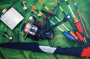 Fishing tackle on a fishing net. Sport and recreation concept
