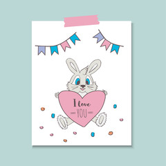 Cute little bunny with a heart with the words I love you.