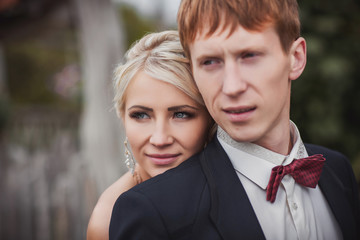 Wedding. Portrait of bride and groom in love, autumn wedding day