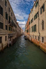 Fototapeta na wymiar Venice city in Italy. Canals, buildings and boats. Travel (vacation) concept. 