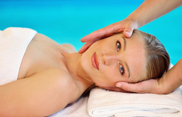 Fototapeta na wymiar Young Caucasian woman on a head massage.