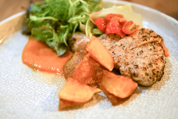 Pork steak in white disc
