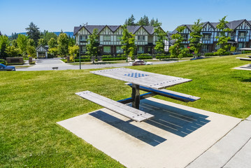 Obraz premium Recreation area with chess table on the block of new townhouses