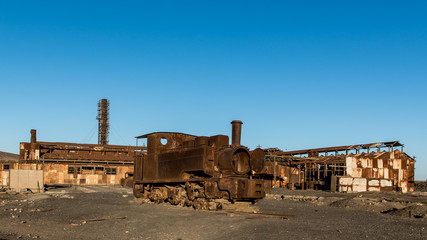 Old locomotives at Humberstone historic Saltpetre works in norther Chile