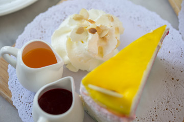 rainbow crape cake with raspberry jam or strawberry jam
