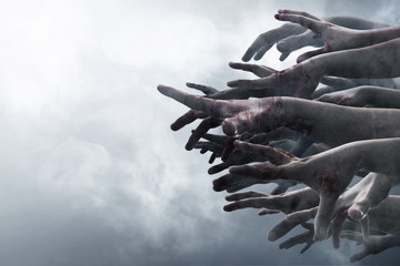 Crowd of stretched zombie hands