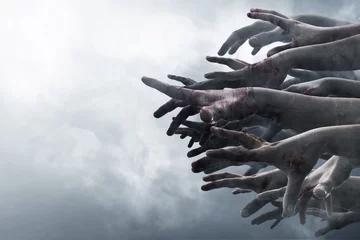 Fotobehang Crowd of stretched zombie hands © fotokitas
