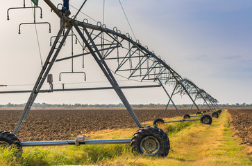 center pivot sprinkler irrigating fields