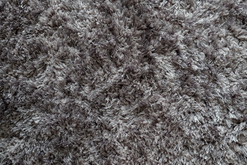 Gray carpet textures with long fibers for background, natural textile