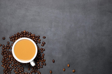 Coffee latte with coffee beans on dark background., Top view.