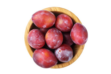 plums in plate isolated
