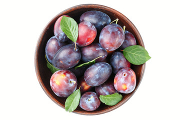 ripe plums on a white background