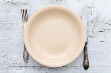 cutlery on wooden table