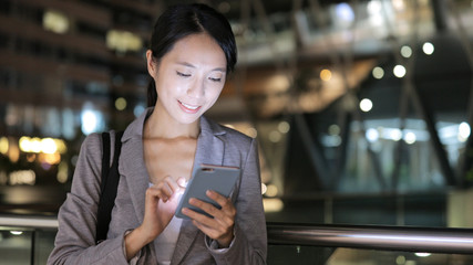 Young business woman use of mobile phone