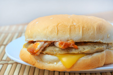 Low cost pork burger with bacon and cheese