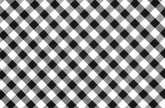 Black and white checked pattern linen fabric texture background, detail closeup