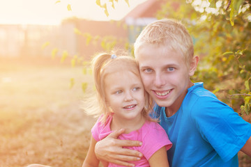 Fototapeta premium Brother and sister on a walk