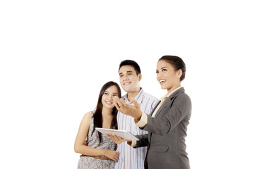 Real estate agent explaining something on studio