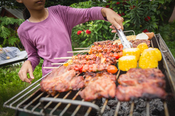 Family holiday vacation barbecue party.