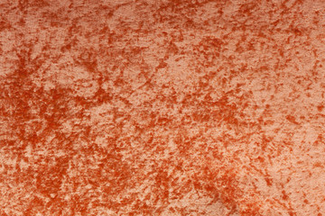 Soft orange stained fabric background pattern