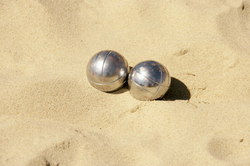 Metal balls in the sand